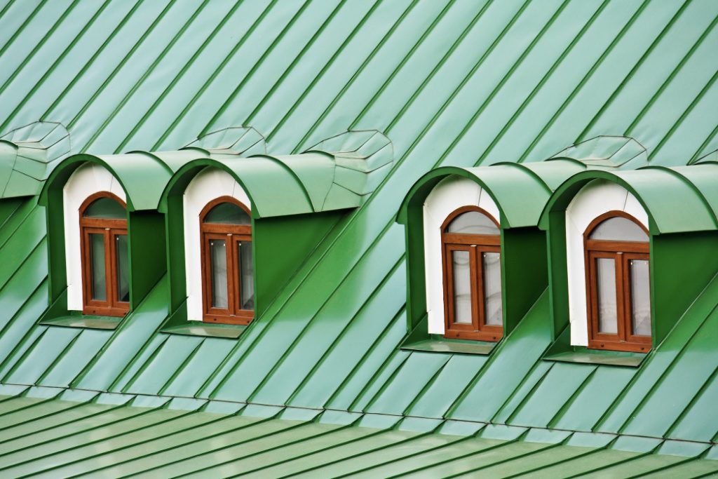 Bed And Breakfast Building With Green Standing Seam Roof