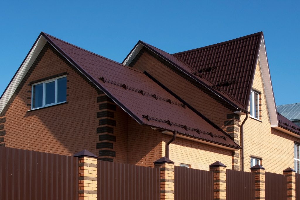 Home With Metal Tile Roof And Snow Guards