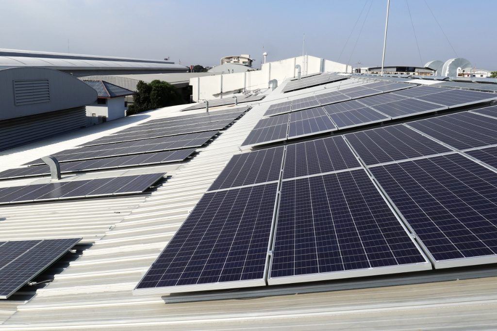 Industrial Building With Metal Roof And Solar Panels