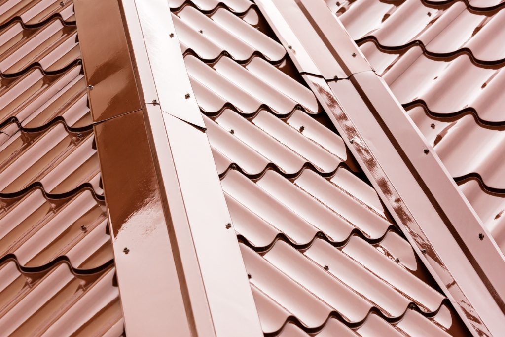 Red Metal Tile Roofing Panels Close Up Shot